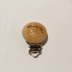 Seleclips i tr med tekst 