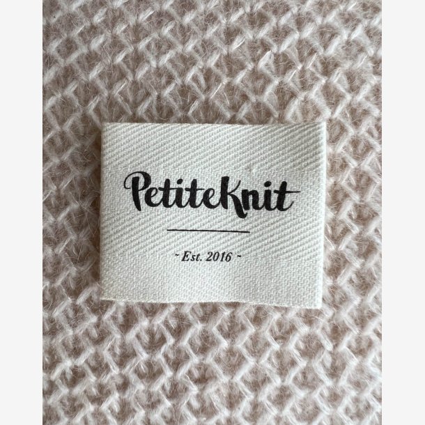 "PetiteKnit - Est 2016" label