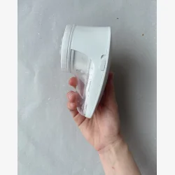 Refresh Your Knit With PetiteKnit" - Lint Remover